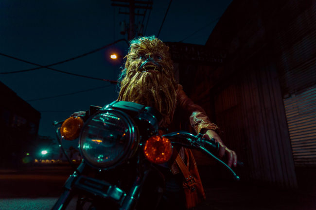 2:53 am Photograph by Mako Miyamoto. Wookie badass riding a motorcycle at night under a streetlight. Part of the Holding Off Eternity series for a show at Gallery 135 in Portland, OR