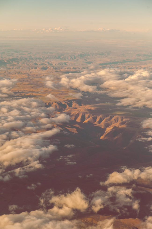 Falling Up by Mako Miyamoto clouds sky blue flight travel mountains photography oregon